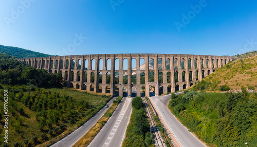 Aerial view panorama. The Aqueduct of Vanvitelli, Caroline. Valle di Maddaloni, near Caserta Italy. 17th century. Large stone structure for transporting water. Viaduct. photo