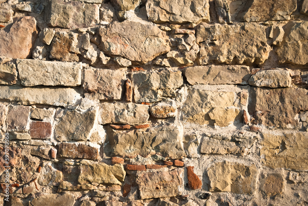 Fototapeta premium he stone background.wall of old ancient stones and bricks