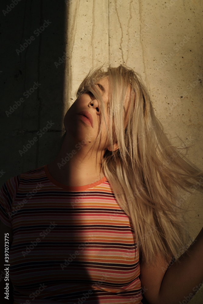 Portrait of a woman with concrete background Portrait of a woman with concrete background