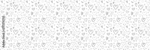 Monochrome background with hand drawn hearts. Seamless light pattern. Valentine's day. Black and white illustration