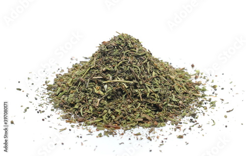 Dry chopped summer savory (Satureja hortensis) isolated on white background