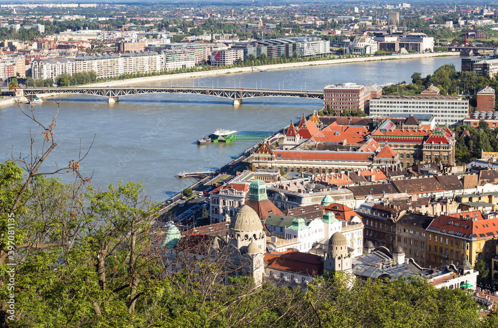 Panoramic cityscape view of Budapest from the Gellert Hill, capital of Hungary. The bridges connecting Buda and Pest across the river Danube. 