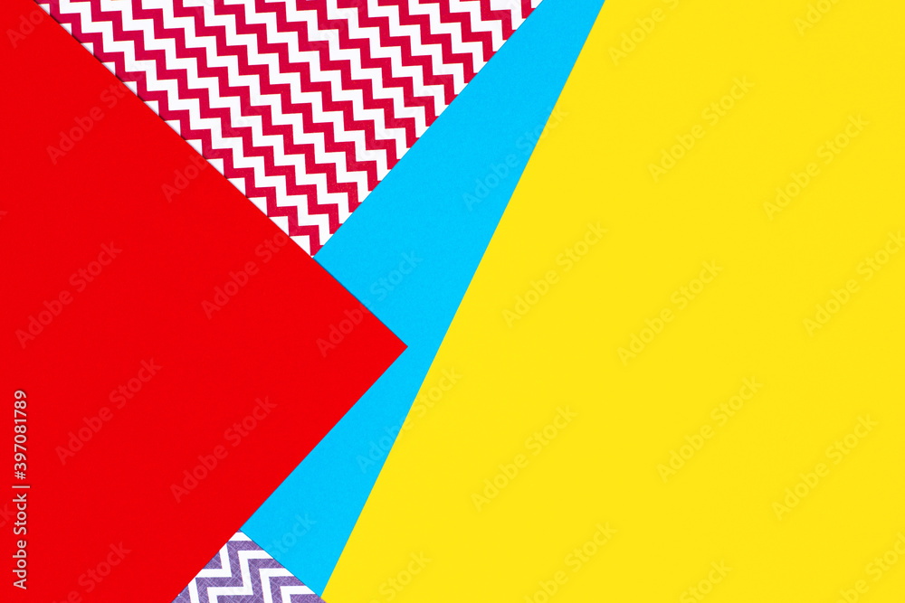 Abstract geometric fashion papers texture background in yellow, red, pink, blue colors. Top view, flat lay Abstract geometric fashion papers texture background in yellow, red, pink, blue colors. Top view, flat lay