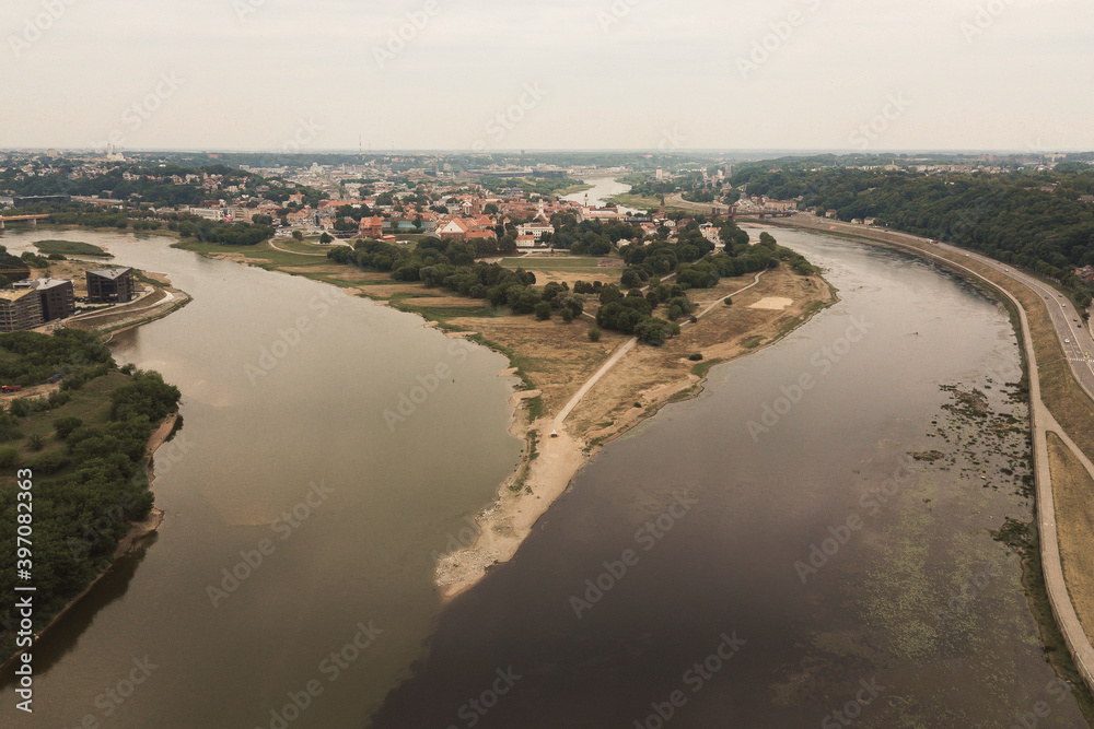 look view from above drone shot aerial Kaunas, Lithuania river Nemunas Nemuna two color river