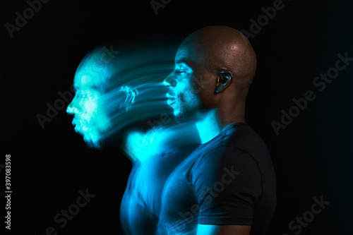 Black man in motion colorful portrait photo