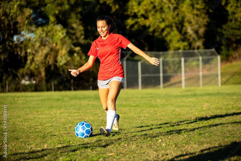 Young girls playing soccer scrimmage game Young girls playing soccer scrimmage game