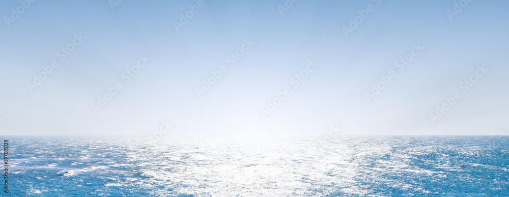 Scenic panoramic view of a beautiful dawn over the sea. Horizon over a calm ocean or sea