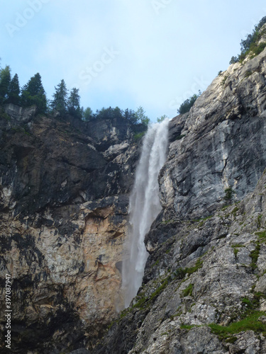 Waterfall at Seebenklettersteig via ferrata, Tyrol, Austria in summertime