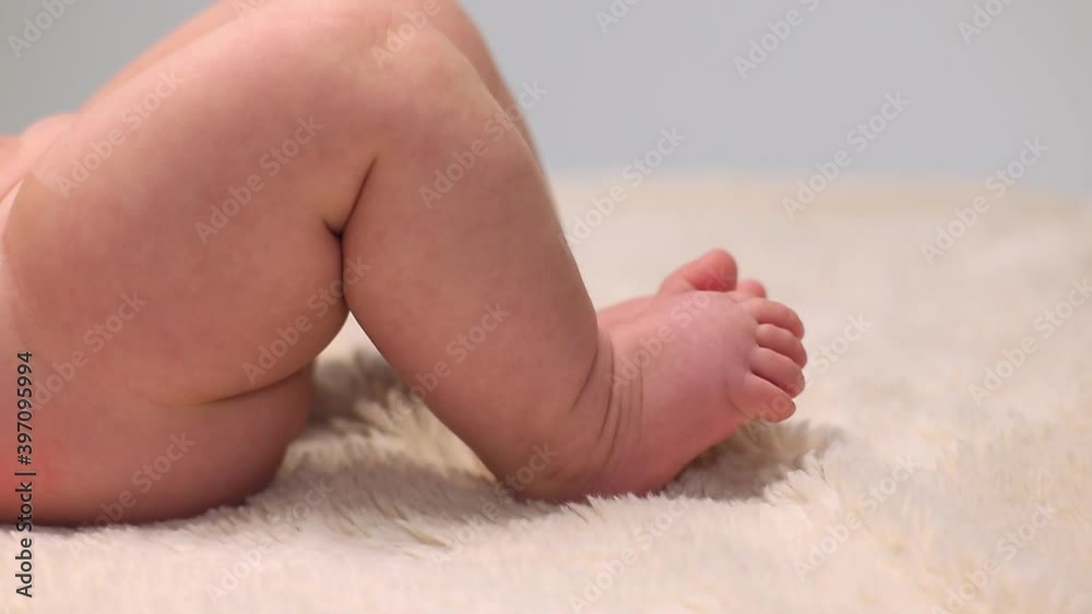 Caucasian baby girl laying on carpet Caucasian baby girl laying on carpet