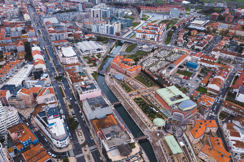 drone shot aerial view from above look Aveiro Portugal cloudy day city center rooftops orange red 