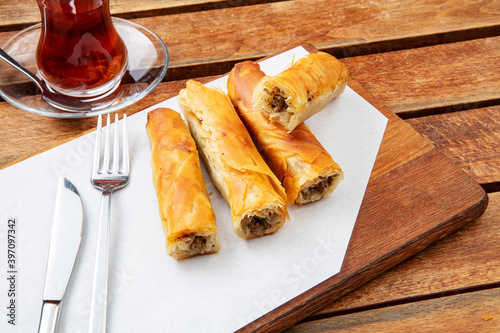 Turkish Tepsi Boregi, Round Borek, Tray pastry (Turkish name; rulo borek - sigara boregi) photo