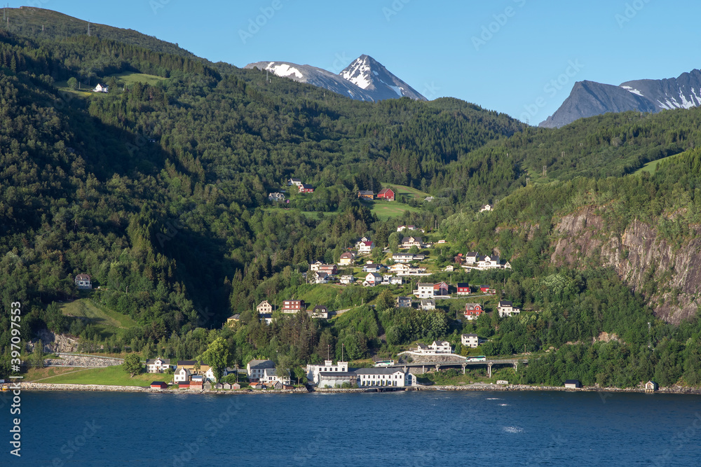 Amazing view on the villae and mountains of the fjord in Norway