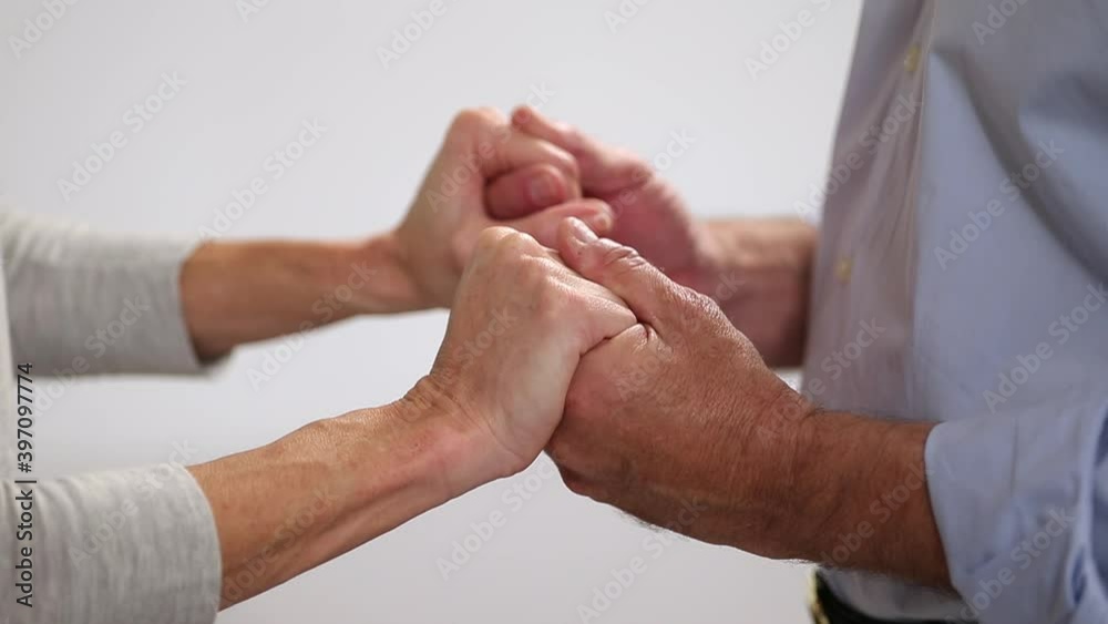 Close up of couple holding hands Close up of couple holding hands