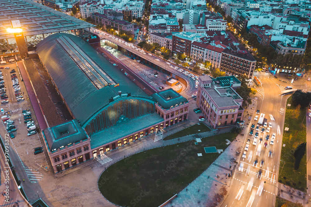 look from above view aerial drone shot Spain Madrid capital cloudy evening buildings lamps Estación del Arte