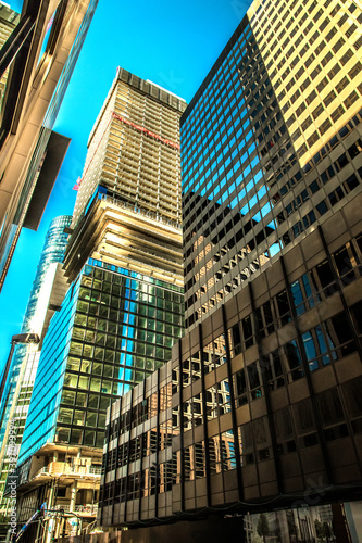 Frankfurt on Main, Germany, 27 september 2018. Modern beautiful new skyscraper in the bussines part of the city against the blue sky on a sunny day without people a wide viewing angle