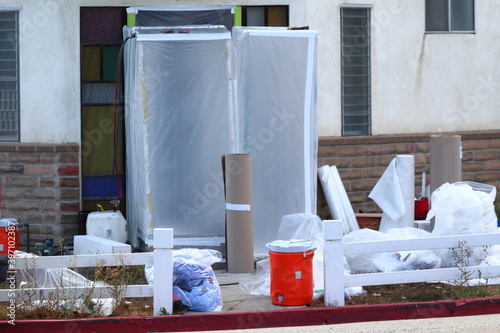 A residential home having existing asbestos removed by  a certified removal specialist.