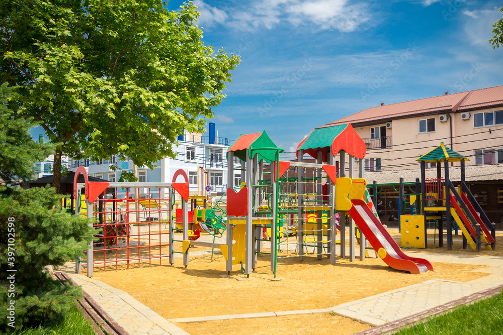 Children's playground for physical activities in courtyard summer view.