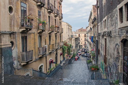 Typical narrow street of Catania, Italy