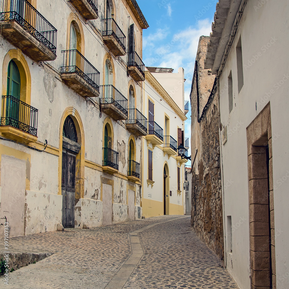 Classical street of old town in Ibiza, Spain