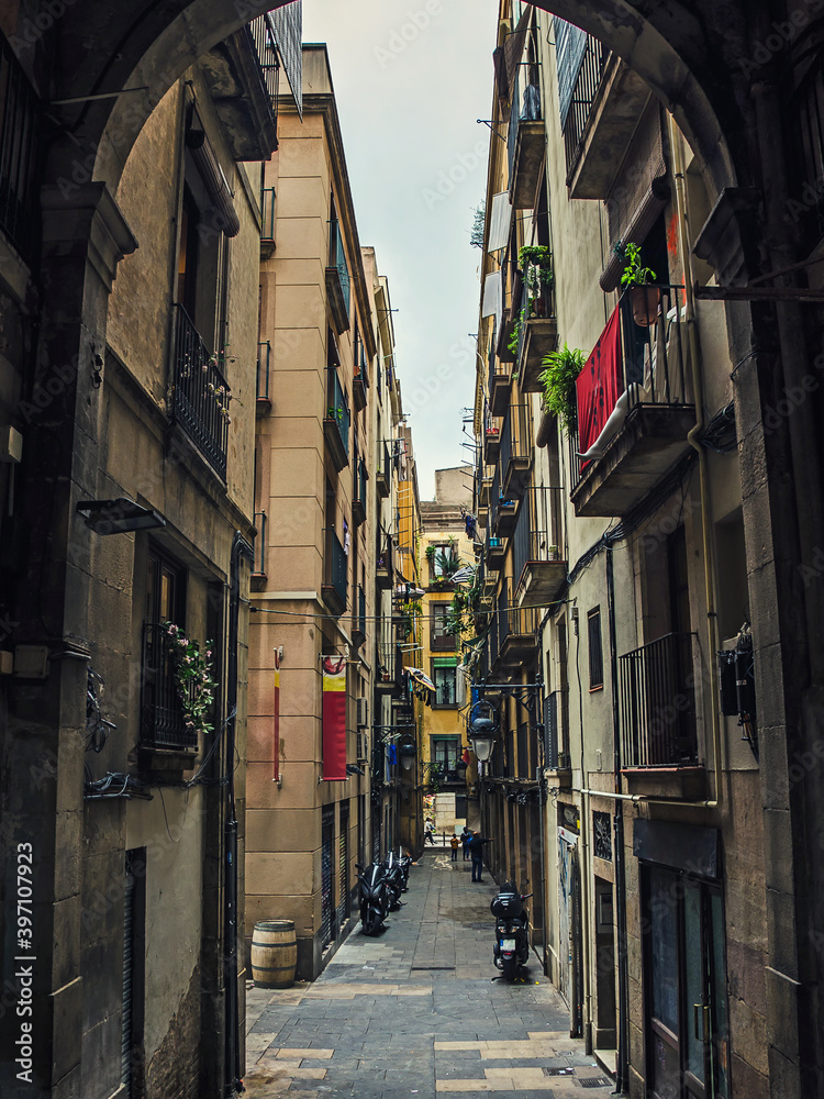 Narrow street in old town of Barcelona, Spain