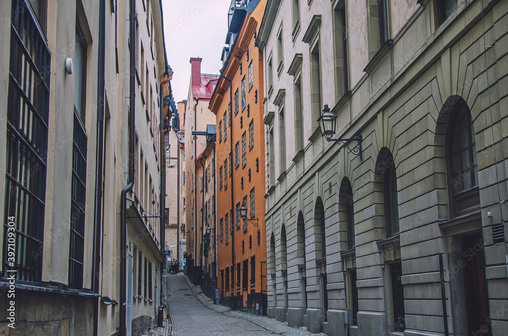 Narrow street of old classical houses in Stockholm, Sweden