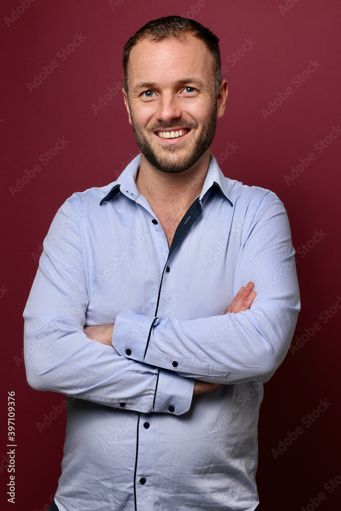Portrait of a man in front of a colored background Portrait of a man in front of a colored background