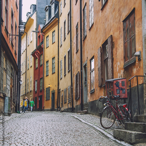 Narrow street of old classical houses in Stockholm, Sweden