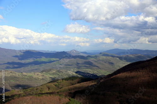 Range of mountains under a cloudy clear blue sky, Roccaraso, Abruzzo, Italy