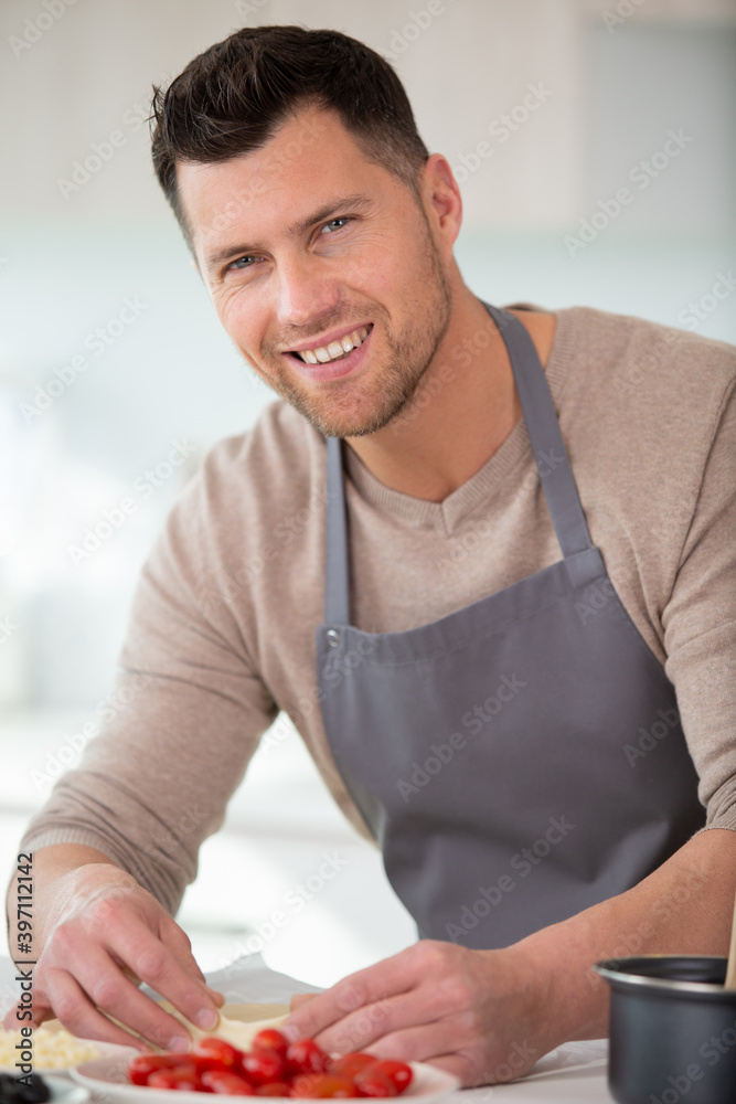 man prepare meal in the kitchen man prepare meal in the kitchen