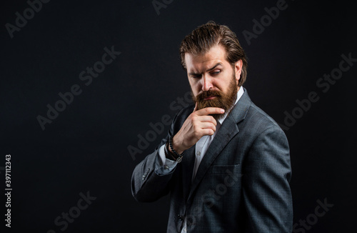 stylish art director. real boss in vest. mature bearded man. confidence and charisma. handsome man wear office suit. male beauty and fashion. brutal businessman with perfect beard and moustache