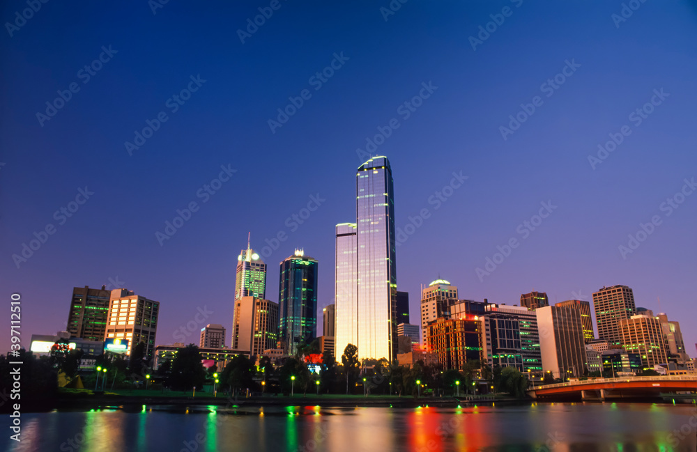 The Rialto building at dusk, Melbourne, Victoria, Australia, with the Yarra river in foreground