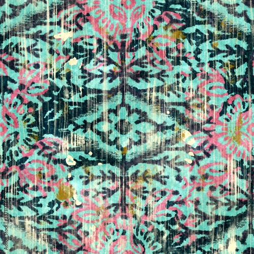 Seamless grungy tribal ethnic rug motif pattern. High quality illustration. Distressed old looking native style design in teal, pink, navy, and gold colors. Old artisan textile seamless pattern.