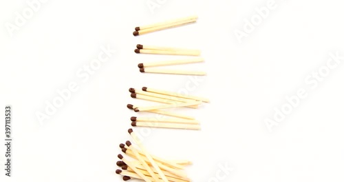 scattered matches on a white background video 4k