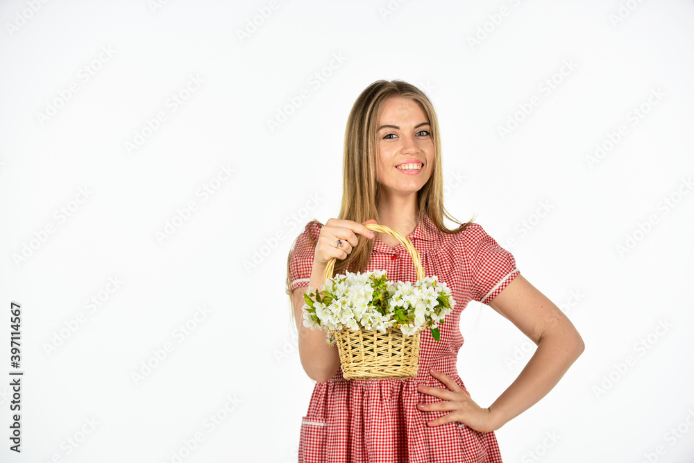 happy woman carry flowers in basket. spring blossom arrangement. beautiful summer bloom. female florist designer. womens and mothers day. girl at flower shop. natural gift. Danger in a vase happy woman carry flowers in basket. spring blossom arrangement. beautiful summer bloom. female florist designer. womens and mothers day. girl at flower shop. natural gift. Danger in a vase