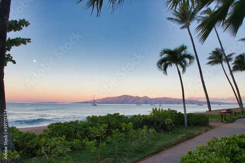 Twilight view of Molokai from the path at Kaanapali Beach on Maui.