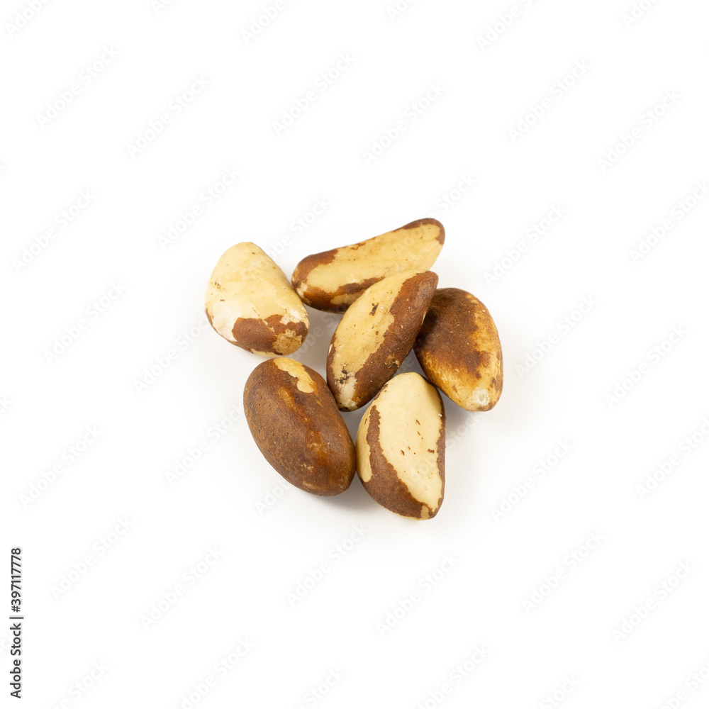 Obraz premium A handful of Brazil nuts on a white background