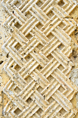 фотографія Ancient ornament, carvings on stone