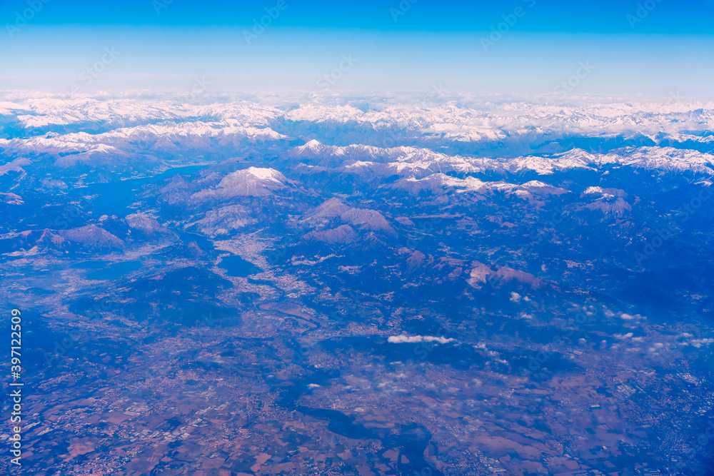 Amazing aerial shot of mountains with snowy peak 