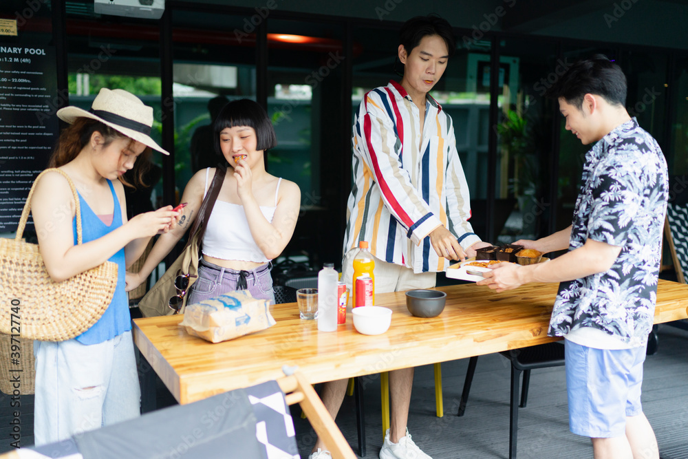 Group of tourist people enjoy eating snack in summer party at hotel lounge. Group of tourist people enjoy eating snack in summer party at hotel lounge.