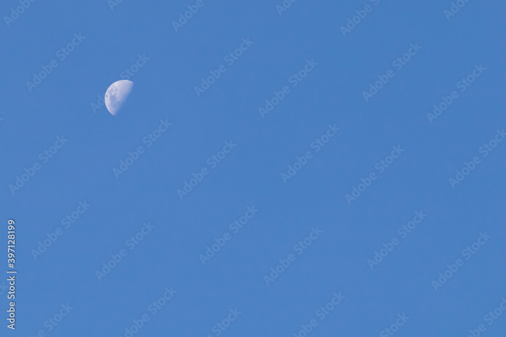 Crescent moon in the blue sky. Minimalism Crescent moon in the blue sky. Minimalism