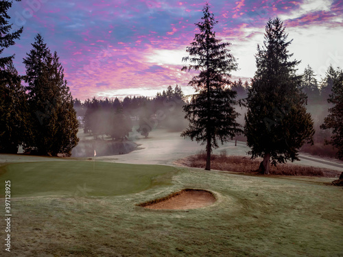 Fog and sunrise on a golf course