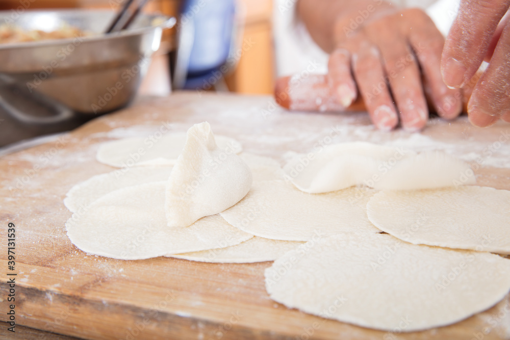 Making dumplings before traditional Chinese festivals and preparing to celebrate Making dumplings before traditional Chinese festivals and preparing to celebrate