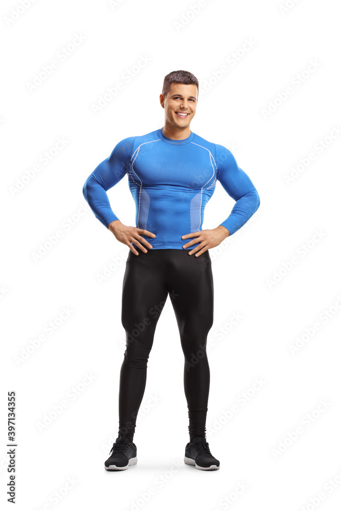 Full length portrait of a fit muscular man in leggings and tight top Full length portrait of a fit muscular man in leggings and tight top
