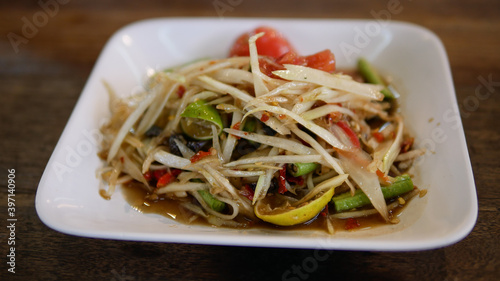 Somtum or green papaya Salad mixed with crab and pickled fish, Thai traditional food.