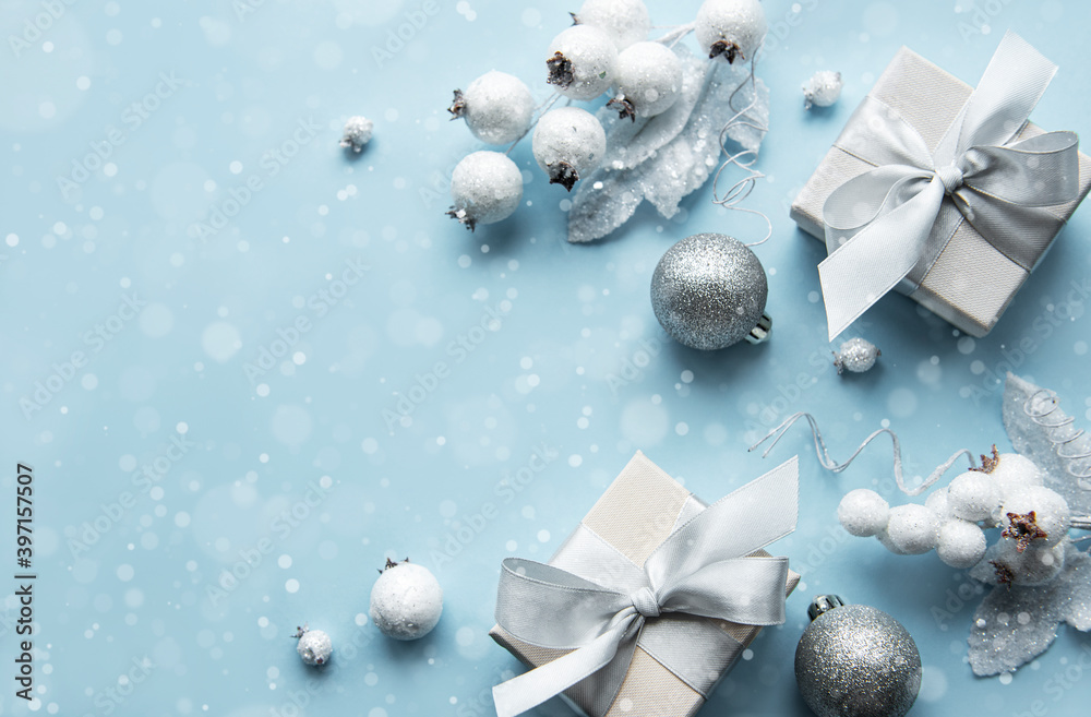 Frame made of white decorations on pastel blue background Frame made of white decorations on pastel blue background