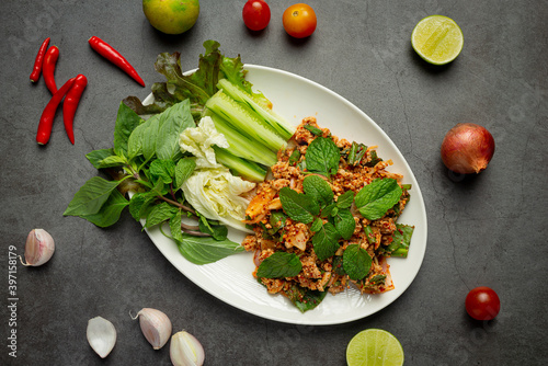 Thai food spicy minced pork serve with side dishes