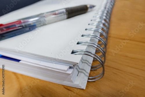 Focus on the steel loop of the notebook