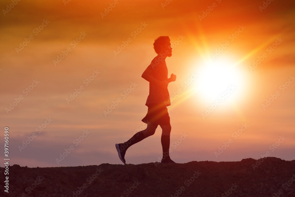 Man running at sunset concept sport healthy lifestyle