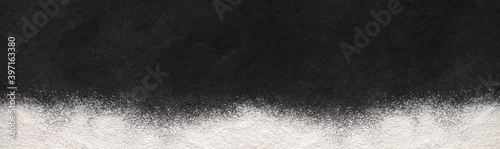 Panel kuchenny z motywem Baking background with flour banner on dark surface with space for text. Top view.