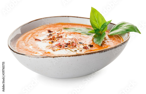 Obraz na plátně Bowl of tasty tomato cream soup isolated  on  white background